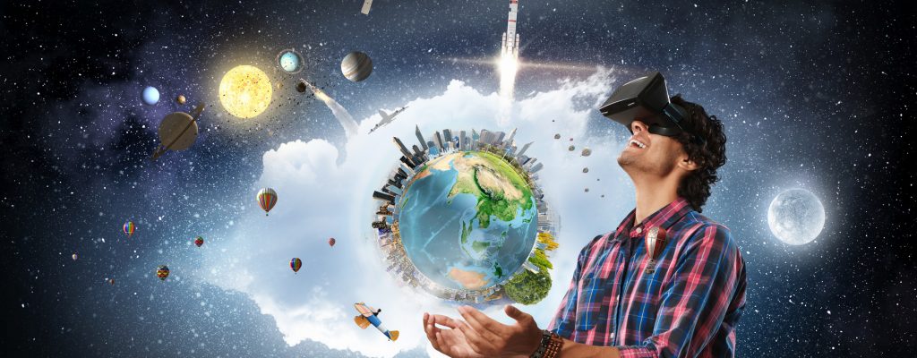 Young excited man in helmet experiencing virtual reality. Elements of this image are furnished by NASA