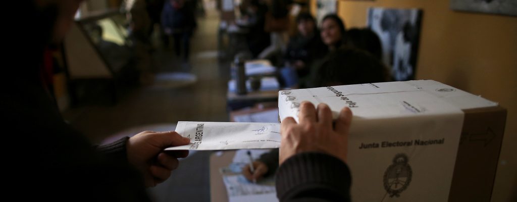 A person votes at a polling station during the primary elections, in Buenos Aires, Argentina, August 11, 2019.  REUTERS/Agustin Marcarian